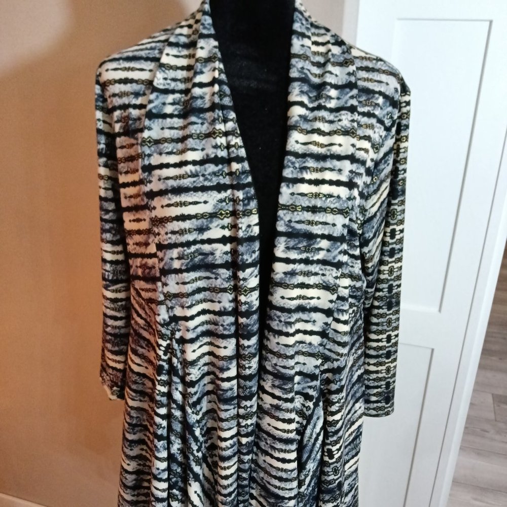 A new draped front jacket covered in an abstract geometric print by Jostar.